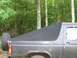 Custom made boat canvas Fastback style soft top, no rear window. Snaps attached to body.